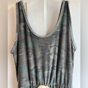 Jumpsuit, dark colors.